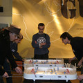 THE ROOM STARTS THE CHOICE OF COMPETITORS FOR A TABLE HOCKEY TOURNAMENT